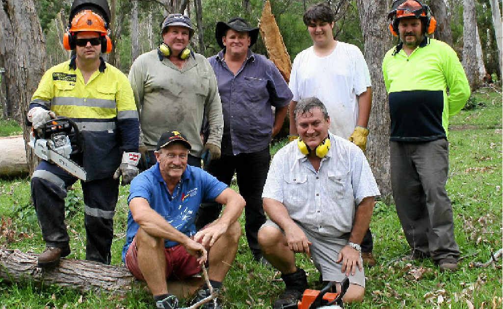 Members of the Brisbane Toyota Landcruiser Club of Queensland help with the flood clean-up at Gordon Country.